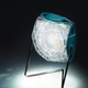 The Little Sun Diamond lights up against a dark background